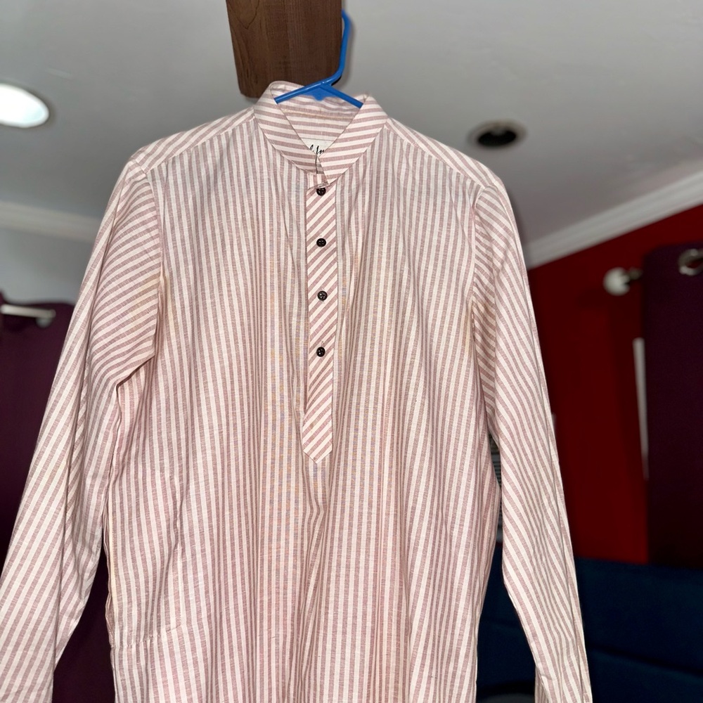 Small tea, pink Pakistani kurta